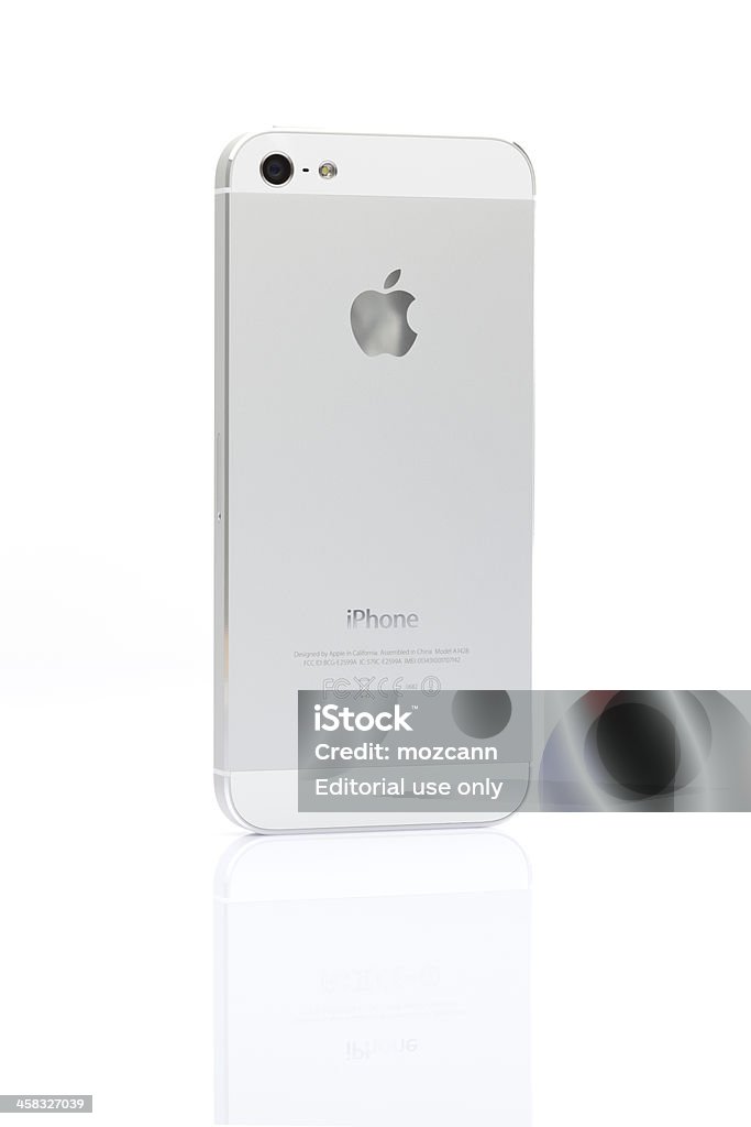 iPhone5 Istanbul, Turkey - February 6, 2013: Back view of a Apple iPhone 5 showing the phone's rear camera, LED flash and the Apple logo isolated on a white background. The iPhone 5 was released for sale in retail stores by Apple Inc on September 21, 2012. Apple Computers Stock Photo