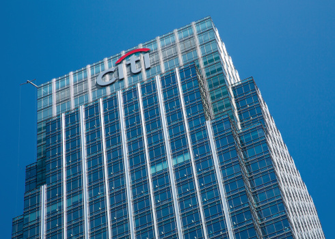 London, United Kingdom - July 5, 2013:  The headquarters of Citibank at Canary Wharf in the financial heart of London pictured against a clear blue sky