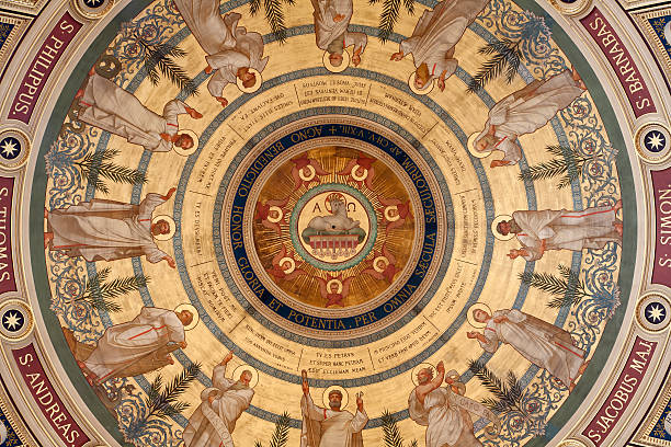 Paris - fresco from cupola of Saint Francois Xavier church Paris - France, June 18, 2011: Fresco from cupola of Saint Francois Xavier church with the Agnus Dei in the center and  twelve apostle from 20- cent. agnus dei stock pictures, royalty-free photos & images