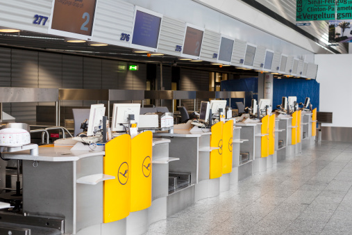 Frankfurt, Germany - April 22, 2013: Ground staff of Lufthansa entered into a one-day token strike. Empty check-in counters at Terminal 1, Airport Frankfurt. Lufthansa is the largest airline in Europe and the world's fifth-largest airline.