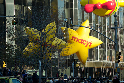 New York, USA - November 22, 2012: Star balloons is flown with two stars near Columbus Circle at the 86th Annual Macy's Thanksgiving Day Parade.