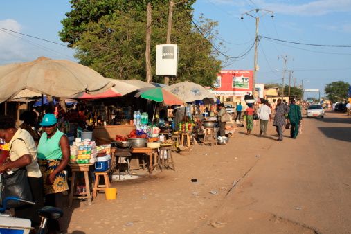 An!AA>ho, Togo - November 9, 2008: African Market close to the broder Togo - Benin.