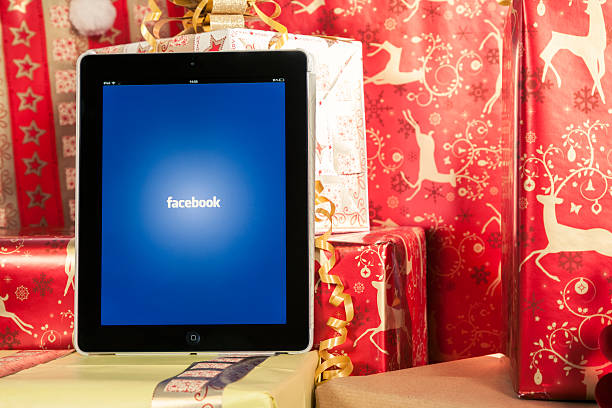 Ipad 3 with Facebook . Christmas stock photo