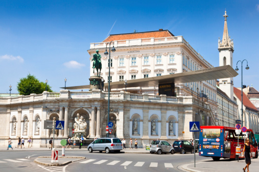 Vienna, Austria - June 19, 2013: Albertina Museum on a beautiful summer day. It houses one of the largest and most important collection of drawings, as well as more modern graphic works, photographs and architectural drawings. Tourists are walking around.