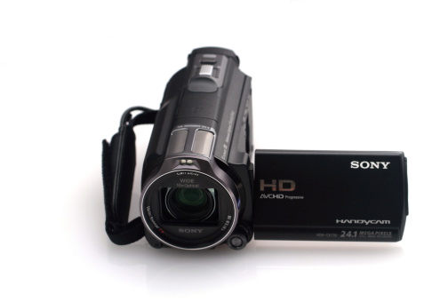 Lausanne, Switzerland - January 4, 2013 : Sony hdr-cx730 camcorder isolated on white background. this camcorder offers very good optical stabilization and semi-pro image quality.
