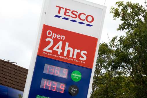 Rugby, England - September 14, 2012: Tesco Supermarket Petrol Station Sign. Showing 24 Hours a day opening from Monday to Saturday. Petrol and Diesel priced in pounds per liter