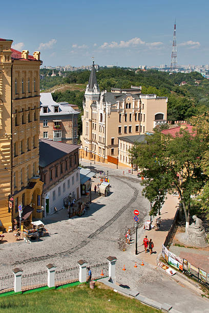 Kiev, Ukraine - July 27, 2012: High view of the Andriyivskyy Descent street with the Castle of Richard the Lionheart on the right in Kiev, Ukraine.
