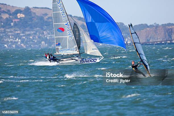 Racing Skiff And Windsurfer Stock Photo - Download Image Now - Adult, Adults Only, Australian Flag