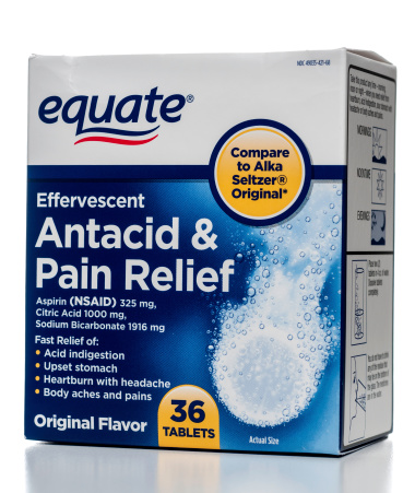 Miami, USA - August 25, 2013: Equate effervescent antacid & pain relief 36 tablets box. Equate is part of Walmart's private label store brands for consumable pharmacy and health items.