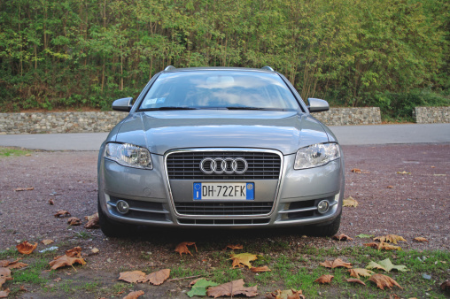 Borgosesia, Italy - November 11, 2012: A row of 2007 Audi A4 Quattro sedans on display at an Audi dealership. The A4 has been built in four generations and is based on Volkswagen's B platform.