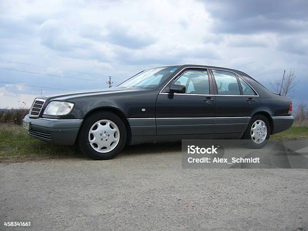 Black Mercedes Benz S500 By Gloomy Sky Stock Photo - Download Image Now - Atmospheric Mood, Black Color, Car