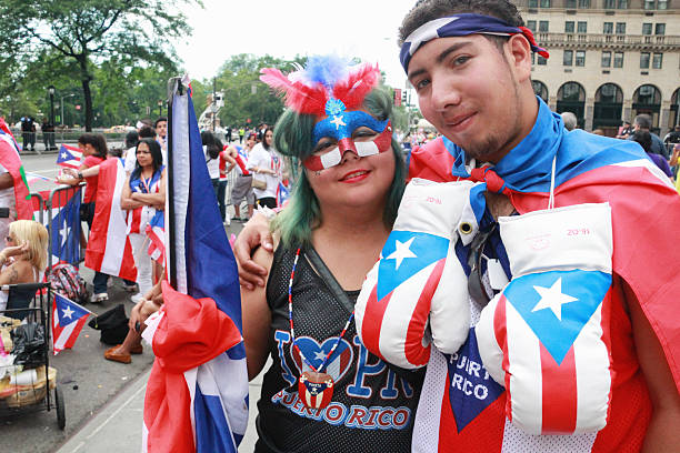 Spectators anticipating the start of Puerto Rican Day Parade stock photo