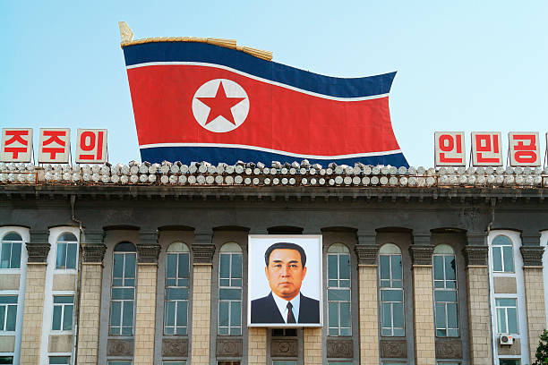 North Korea flag waving background.