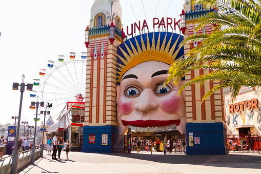 Sydney, Australia - September 23, 2012: Luna Park on a summer sunday, lots of people and children visiting the park and the surrounding Harbour area.