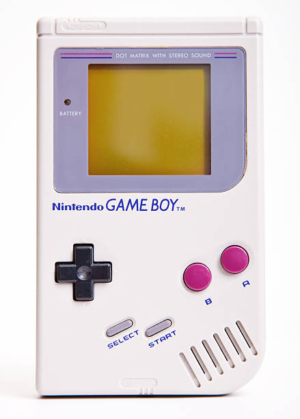 Nintendo Game Boy DAsseldorf, Germany - September 11, 2013: First Nintendo Game Boy classic Edition. This handheld video game, produced by Nintendo, hit the market during the late 1980s and rapidly became a global bestseller. handheld video game stock pictures, royalty-free photos & images