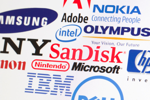 London, United Kingdom- April 22, 2013: Global brand logos photographed on a computer screen. Logos include intel, IBM, Adobe, Sandisk
