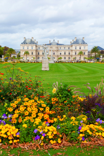 Paris, France - September 06, 2011 : Luxemburg Gardens (Jardin du Luxembourg) and the Luxembourg Palace in a cloudy september day