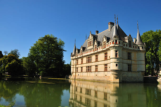 Azay Le Rideau, France - August 20th, 2013: The ChAteau daaAzay-le-Rideau is located in the town of Azay-le-Rideau in the French dApartement of Indre-et-Loire. Built between 1518 and 1527, this chAteau is considered one of the foremost examples of early French renaissance architecture. Set on an island in the middle of the Indre river, this picturesque chAteau has become one of the most popular of the chAteaux of the Loire valley.
