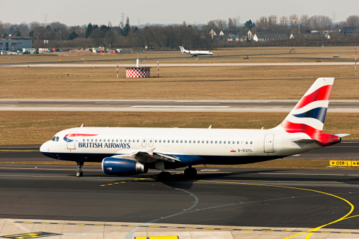 Dusseldorf, Germany - April 1, 2013: An Airbus A320-232 of the airline British Airways landed at the airport Dusseldorf International and rolls to the clearance of passengers at the terminal. London-Heathrow Airport is the home base of British Airways.