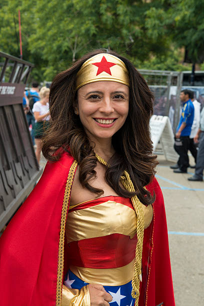 San Diego, California, USA - July 20, 2013: Participants at Comic-Con near the gas lamp district downtown adjacent to Convention Center. Each year, Comic-Con draws hundreds of thousands of visitors, some in full costume for their favorite movie, game, television show, cartoon or comic book.