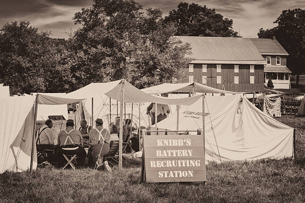  Shot of a campfire at one of the reenactment camp's during The Lincoln Train Event at The North Carolina Transportation Museum.   Photo had been turned into sepia tone for realism.  (Notice the old bed spring used for a grate over the fire).