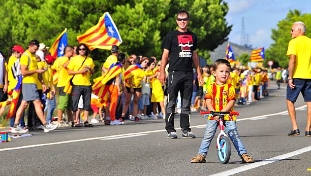 Ametlla de Mar, Spain - September 11, 2013 : Partakers in the Catalan Way  in Ametlla, Spain. 1,6 million people took part in the human chain supporting the independence of Catalonia