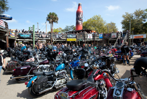 Daytona, Florida, USA - March 7, 2011:  The annual Daytona Beach Bike Week. Over half-a-million motorcycle enthusiasts attend this 10-day motorcycles rally each year. This picture shows motorcycles parked outside of the \