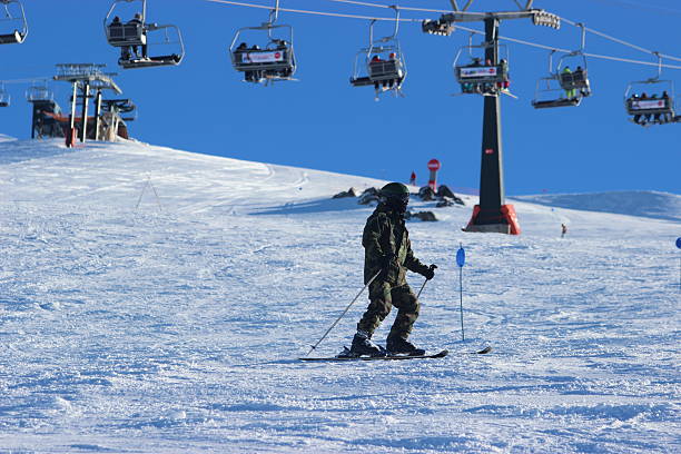 Man skiing alone at ski station CERRO CATEDRAL stock photo