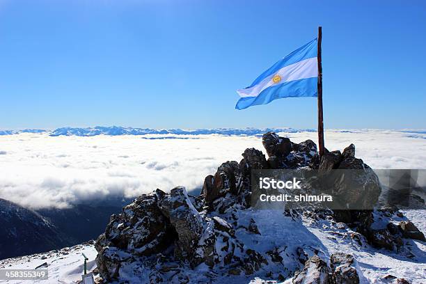 Argentina Flag At Andes Mountains Patagonia Stock Photo - Download Image Now - Andes, Argentina, Bariloche