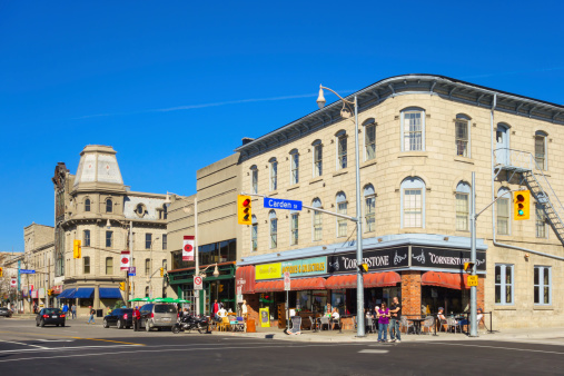 Guelph, Canada - October 12, 2013: View of businesses and people along Wyndham St. in downtown Guelph, Ontario.