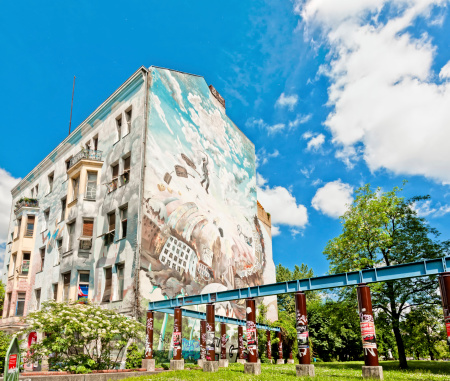 Berlin, Germany - June 10, 2013: mural on building in Friedrichstrasse, Kreuzberg district, on June 10, 2013. Kreuzberg is one of Berlin's cultural centers in the now reunified city .
