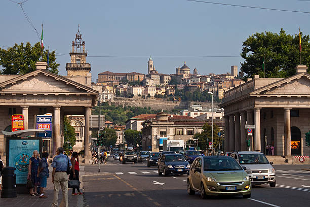 Bergamo, Italy - July 21, 2010:  Street traffic in Bergamo. Bergamo is a town in Lombardy, about 40 km northeast of Milan. It is home to over 120,000 inhabitants.