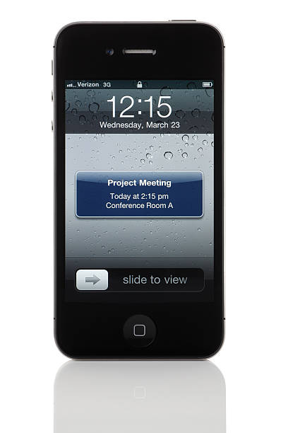 Meeting Reminder on Apple iPhone 4 stock photo