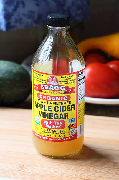 Bottle of Bragg Apple Cider Vinegar stock photo