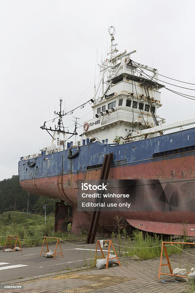 Grounded Fish Boat in Kesennuma, Japan Kesennuma, Japan - September 3, 2013 : The "Dai 18 Kyoei Maru" fishing boat which was inland by the tsunami following the Great East Japan Earthquake in Kesennuma, Miyagi Prefecture, Japan. 2011 Tohoku Earthquake And Tsunami Stock Photo