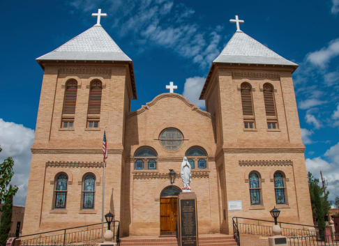 Las Cruces, New Mexico, USA - September 11, 2013: This historic church called Basilica of San Albino was built in 1906 and is now part of the Las Cruces, New Mexico Roman Catholic Diocese. The structure is on the site of the original adobe church, built in 1852 in La Mesilla, New Mexico. La Mesilla, or \