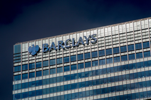 London, United Kingdom - August 28, 2013: The headquarters of Barclays Bank at Canary Wharf in the financial heart of London pictured against a clear blue sky