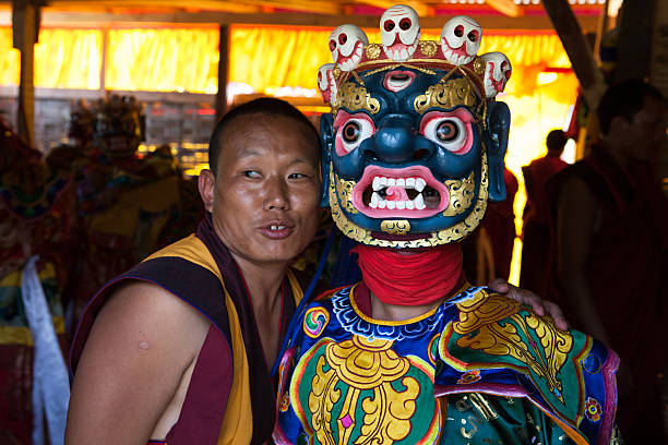 Monks show traditional mask at Wangdi Festival stock photo