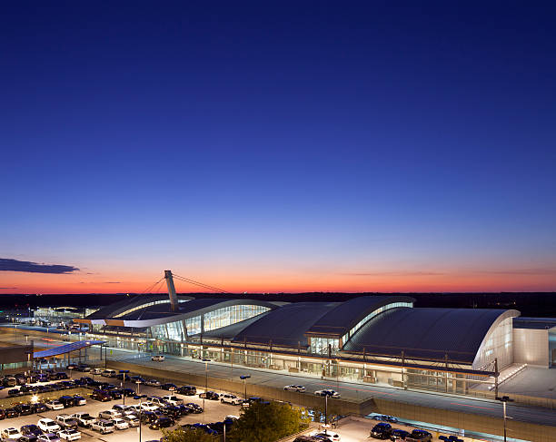 Morrisville, North Carolina, USA - September 27, 2013: A Raleigh-Durham International Airport Terminal as the sun dips below the horizon at twilight.