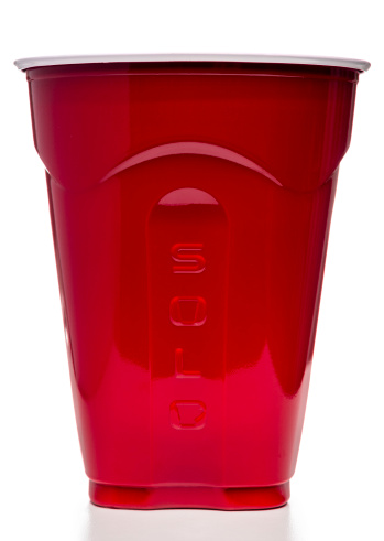 Miami, USA - October 12, 2013: Solo red plastic cup. Solo brand is owned by Solo Cup Company.