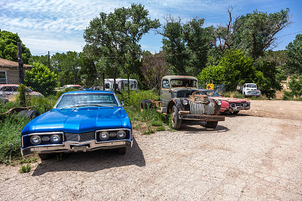 Orderville, USA - July 15, 2008: junk yard with old beautiful oldtimers on the route 89 on July 15, 2008 in Orderville, USA. America is a spot for european classic car hunters.