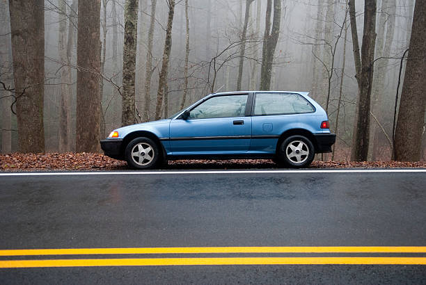 1991 honda civic hatchback no lado da rua - 1991 - fotografias e filmes do acervo