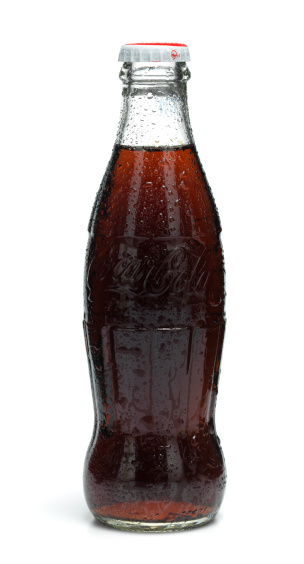 Gothenburg, Sweden - June, 04 2011: Classic Coca Cola bottles photographed in a photo studio.