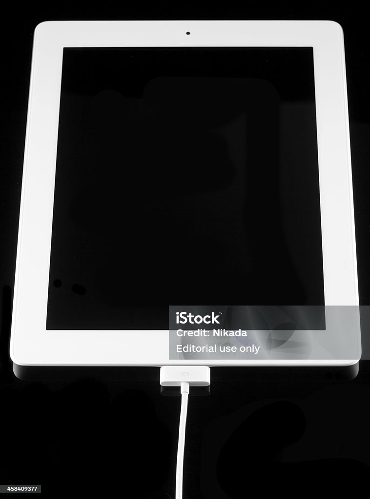 Apple iPad 2 и зарядное устройство - Стоковые фото .com роялти-фри