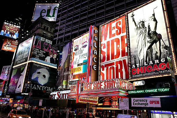 Broadway theater billboards in Times Square New York, USA - November 07, 2010: Times Square, featured with Broadway Theaters and huge number of LED signs, is a famous symbol of New York City and the United States in Manhattan, New York City. musical theater stock pictures, royalty-free photos & images