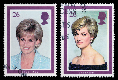 Sacramento, California, USA - April 12, 2008: Two 1998 Great Britain postage stamps designed by Barry Robinson with portraits of Princess Diana, issued to commemorate her life. The portrait with Diana wearing a black dress was taken by photographer Terence Donovan in 1987; the one where she is wearing blue was taken by Jon Stillwell in April 1997.