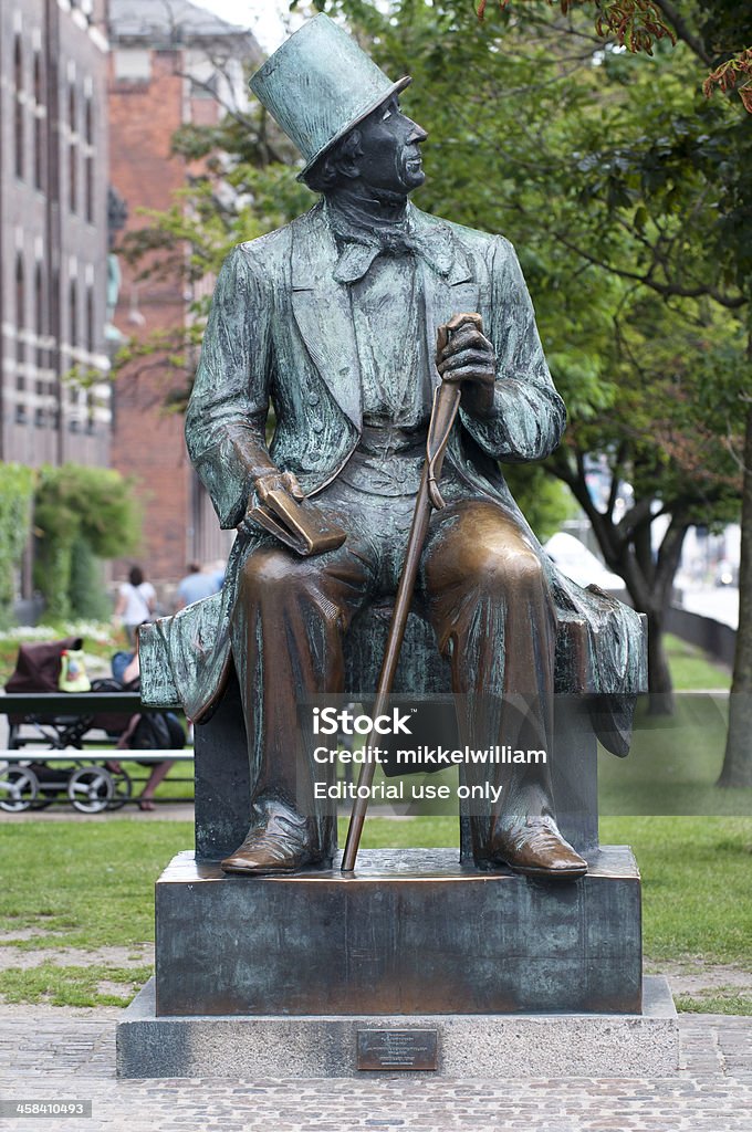 Statue of the famous Danish author Hans Christian Andersen Copenhagen, Denmark - June 30th, 2011: On the city hall square in Copenhagen stands this statue of Hans Christian Andersen whom is a famous Danish author. The statue is made by Henry Luckow-Nielsen in 1965. Fairy Tale Stock Photo