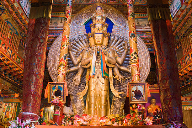 Avalokitesvara Guanyin Kangding, China - October 4, 2007: Avalokitesvara Guanyin Stone carving in Tibetan Buddhist temple - Tagong Temple.This temple is in the Tibetan areas in western Sichuan of China. kannon bosatsu stock pictures, royalty-free photos & images