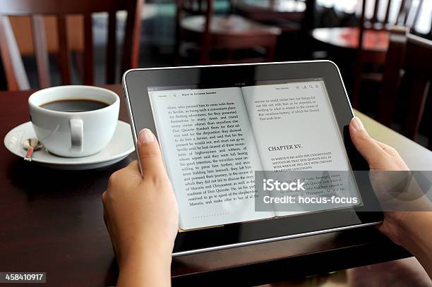 Reading Ebook On Ipad Stock Photo - Download Image Now - E-Reader, Adult, Big Tech