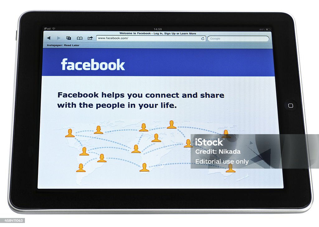 Página do Facebook no iPad tablet digital - Royalty-free .com Foto de stock